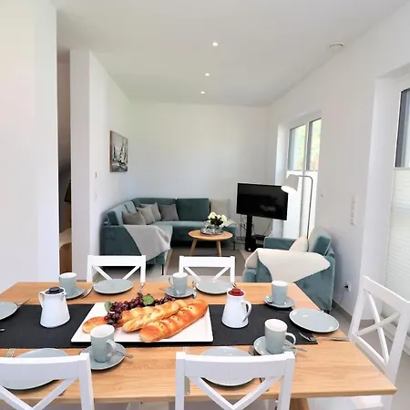 Дом отдыха Ferienhaeuser Ostseekind